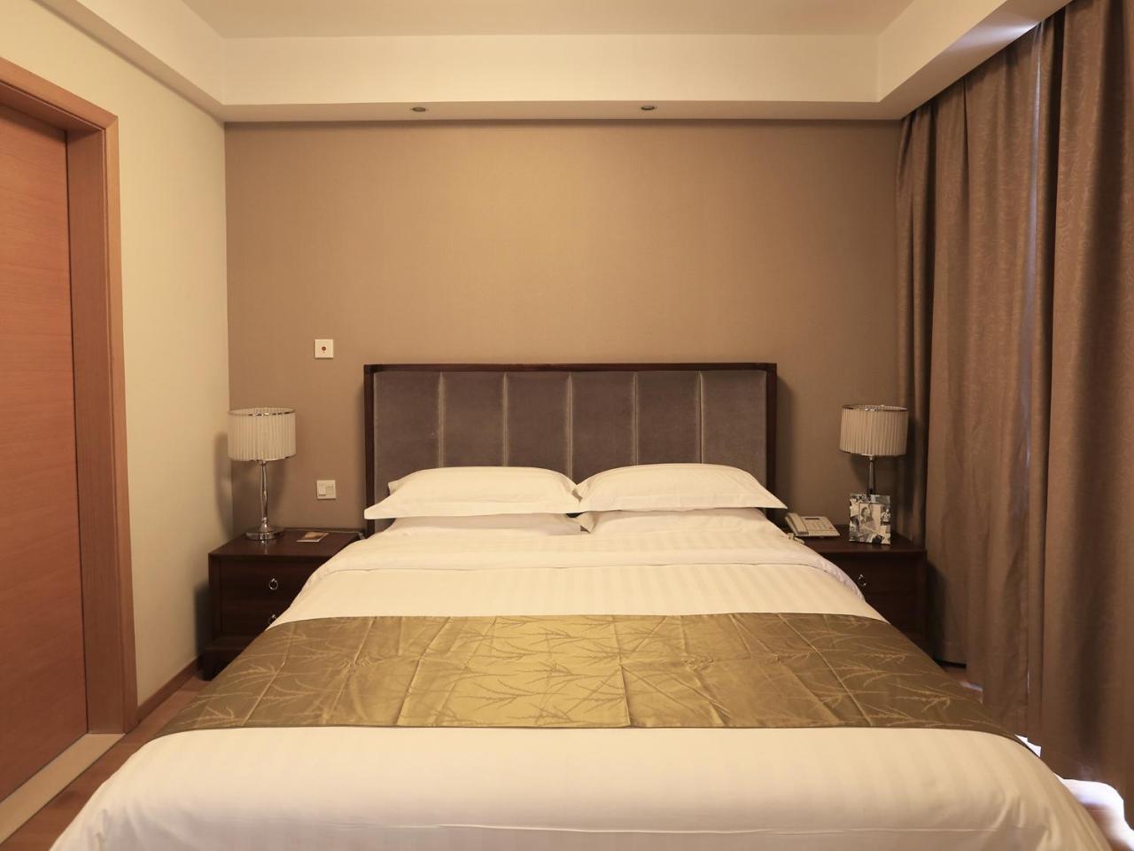 Wuxi Koschenny Graceland Service Residence Exteriör bild